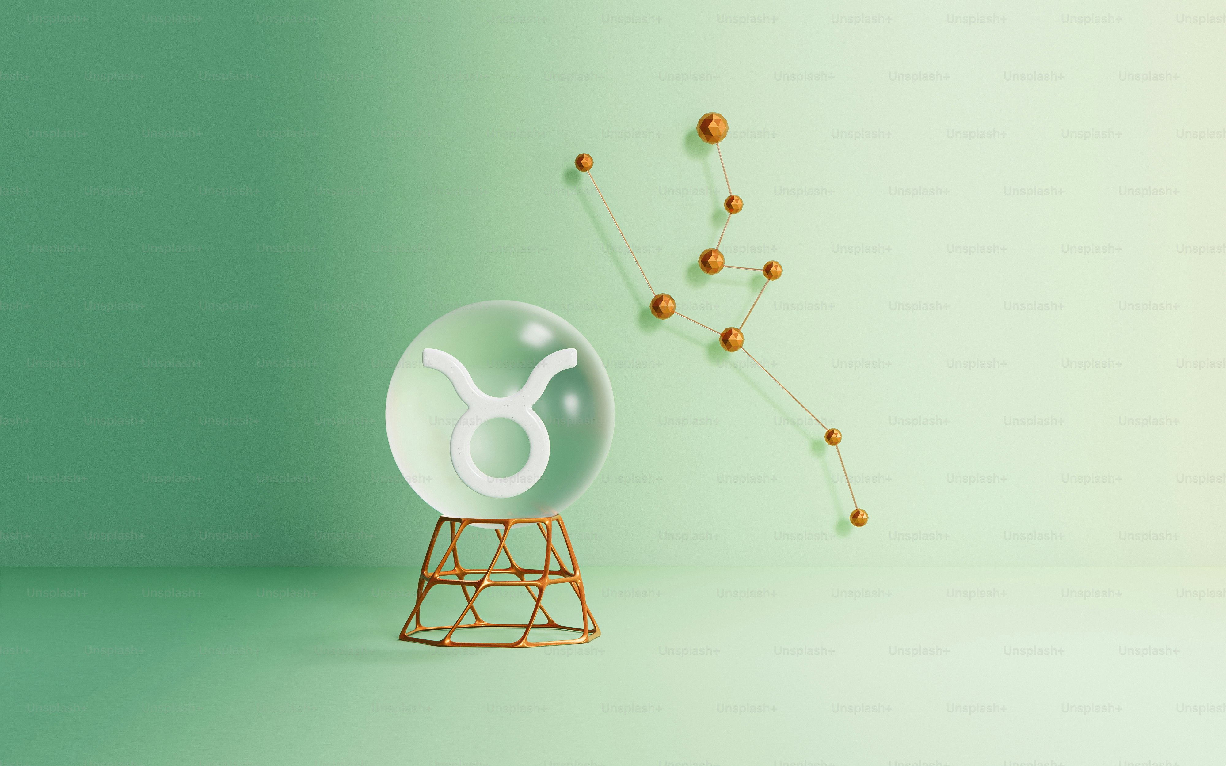 a glass sphere with a zodiac sign on it