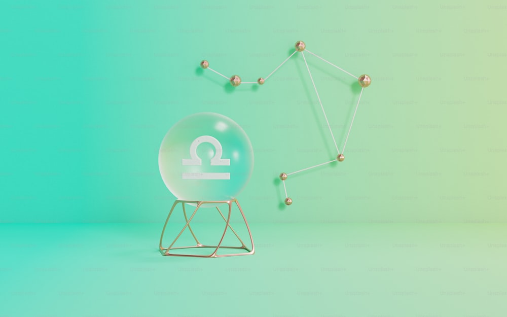 uma esfera de vidro sentada em cima de um suporte de metal