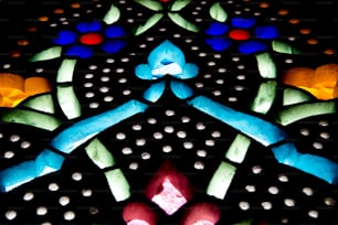 a close up of a stained glass window