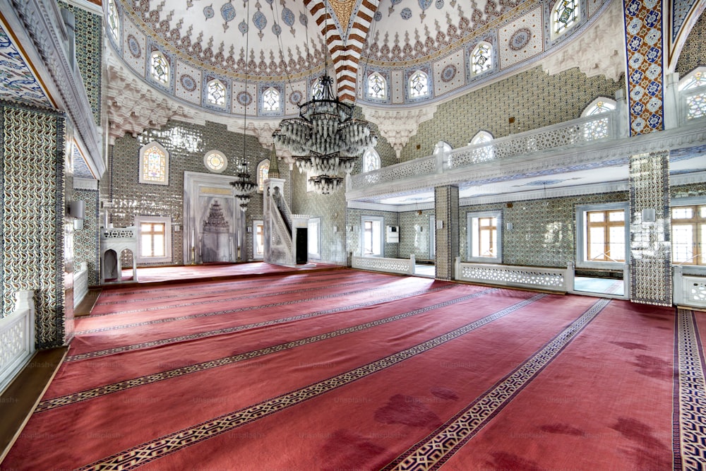 a large room with a chandelier hanging from the ceiling