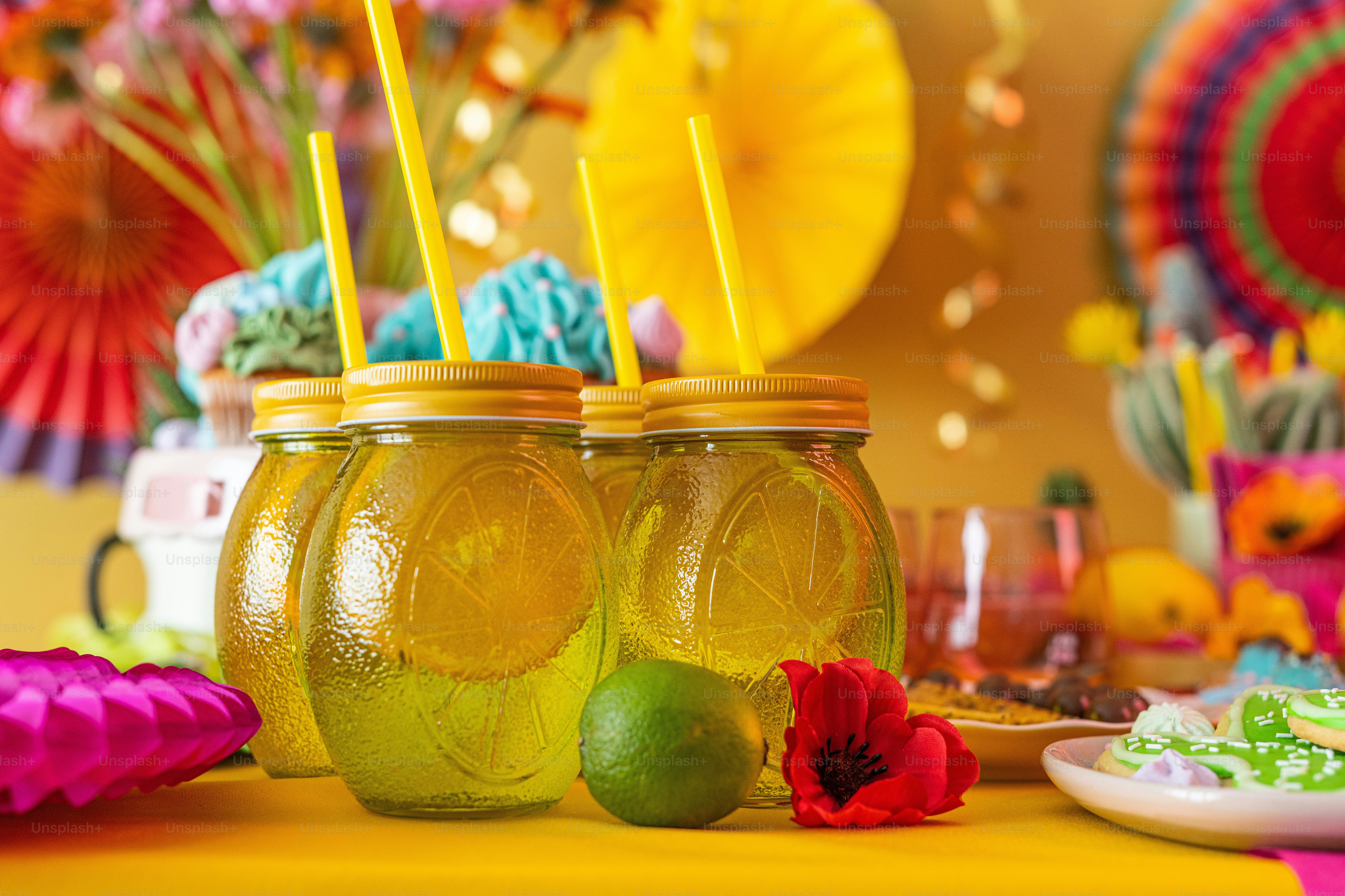 A table topped with mason jars filled with lemons and limes photo – Red  flower Image on Unsplash, image size:3000x2000