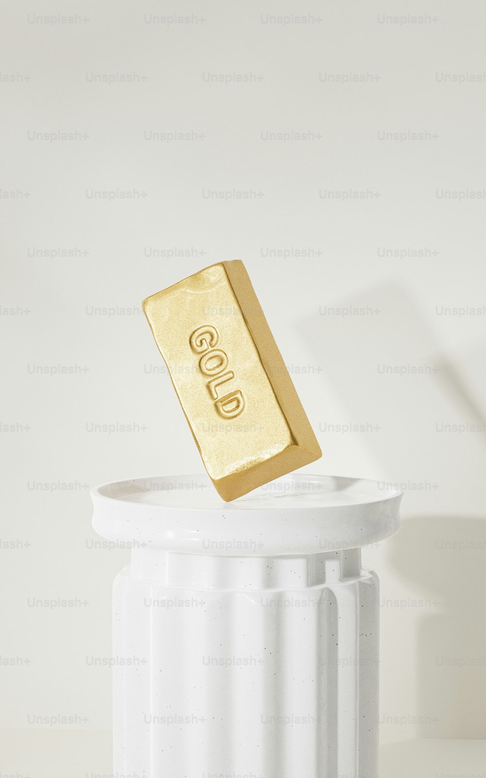 a gold bar sticking out of a white container