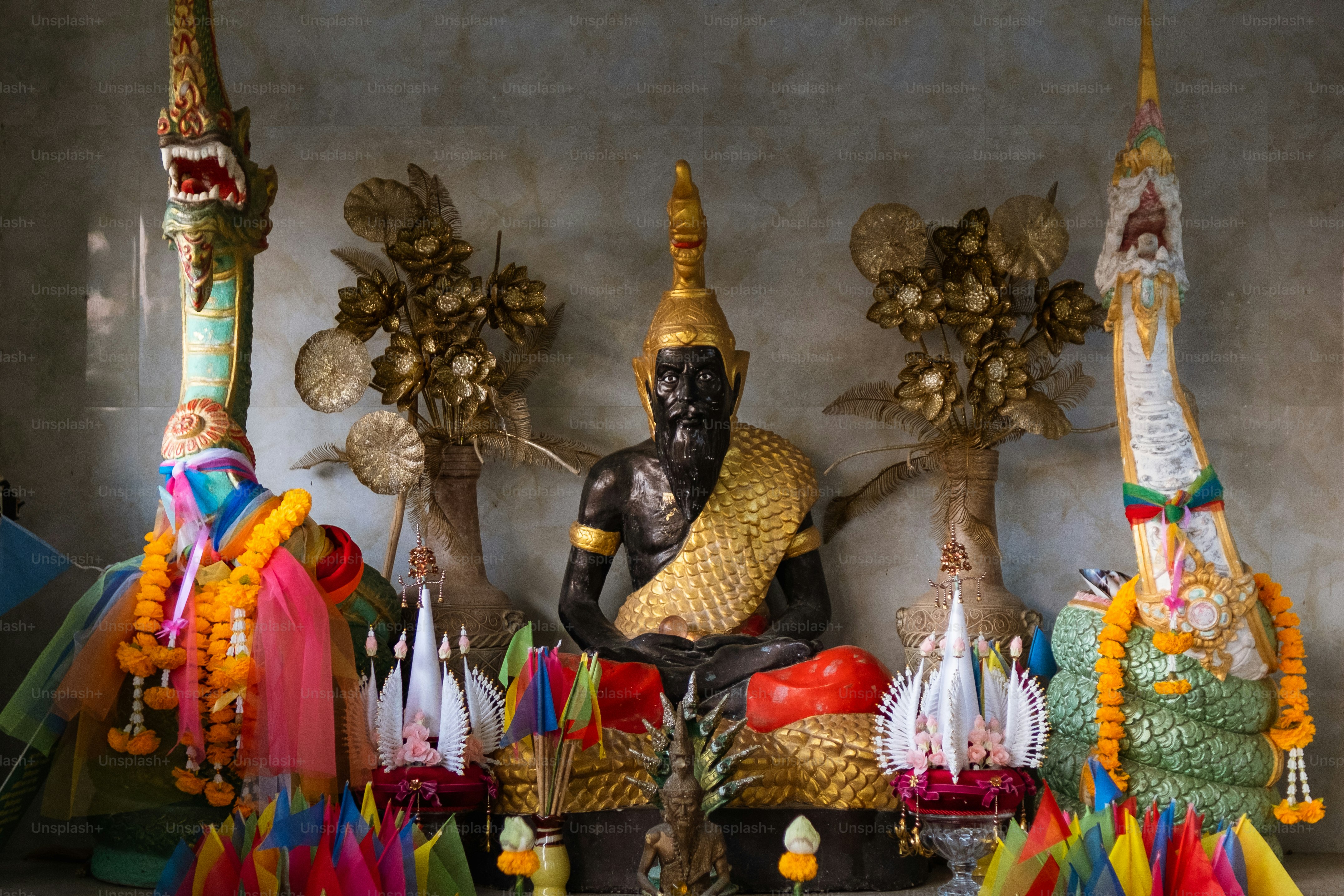 a statue of a person sitting in a room