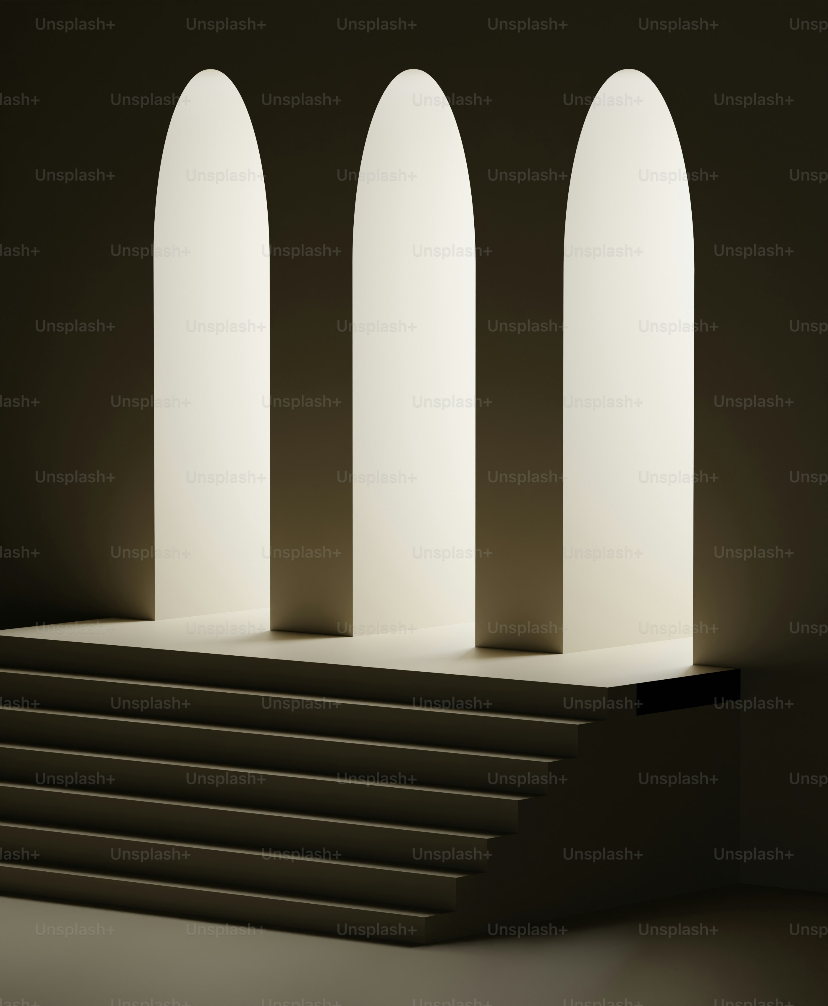 A group of white arches sitting on top of a set of steps photo – Arches ...