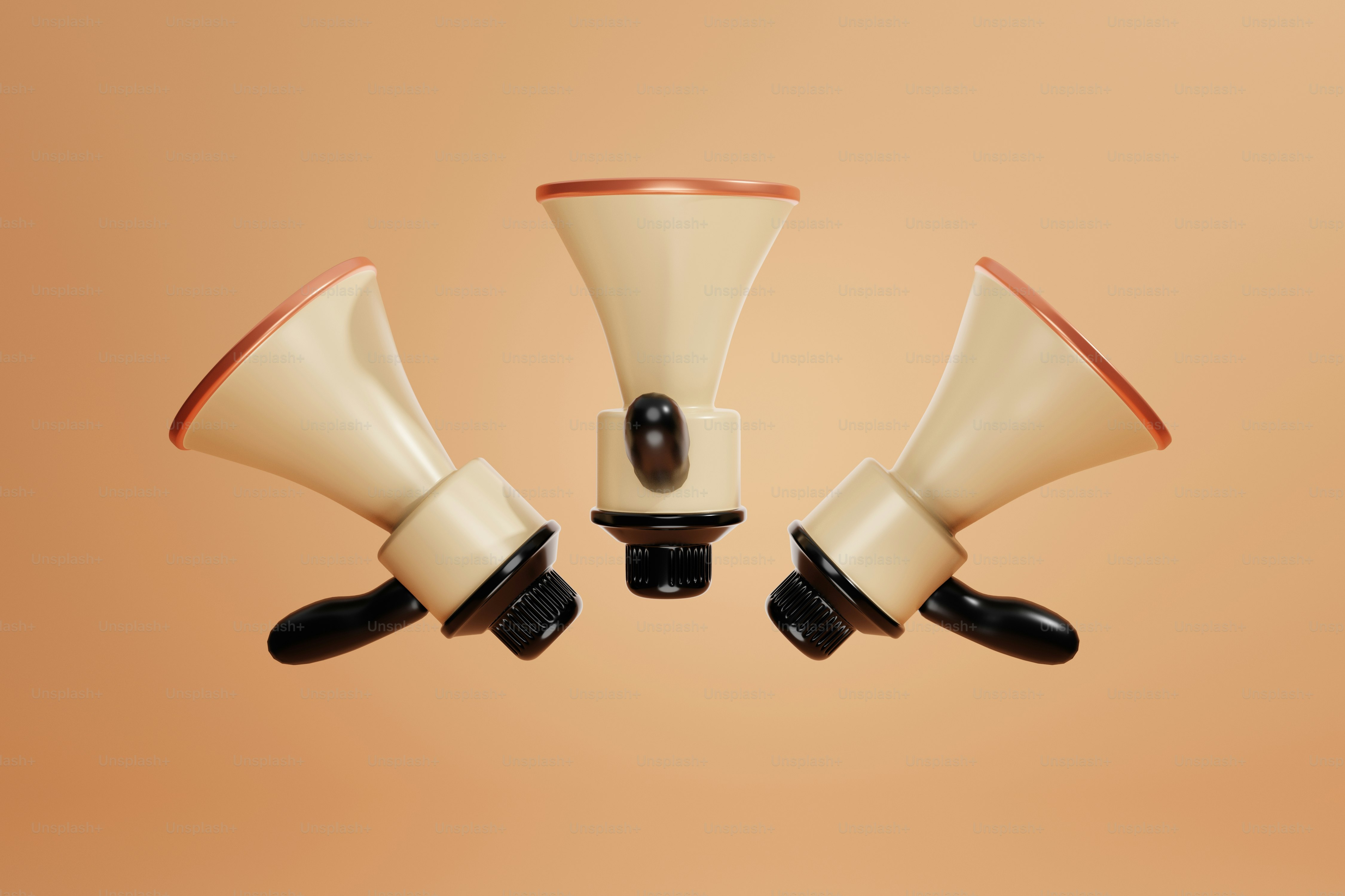 a group of three white and black speakers