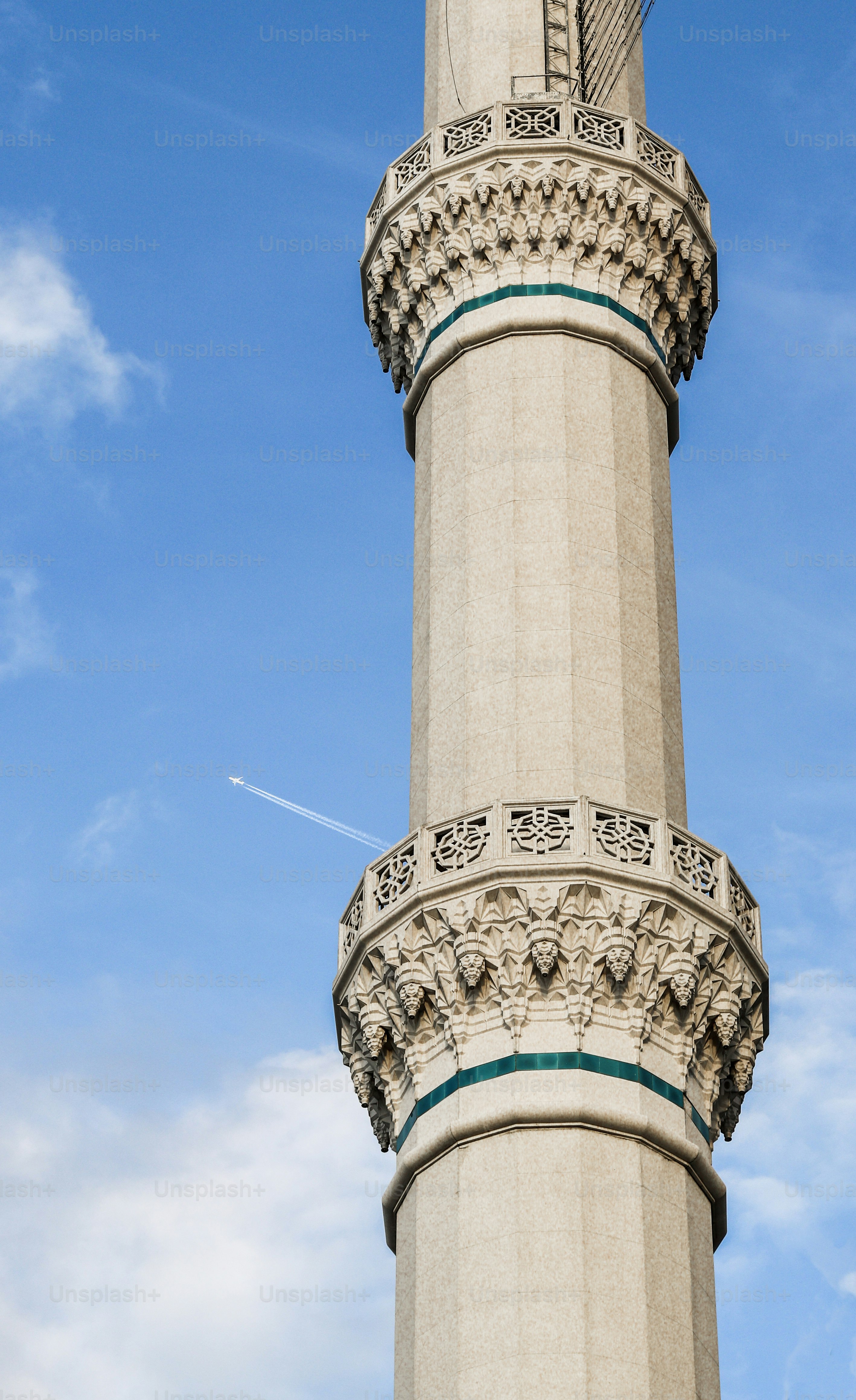 a tall tower with a clock on the top of it