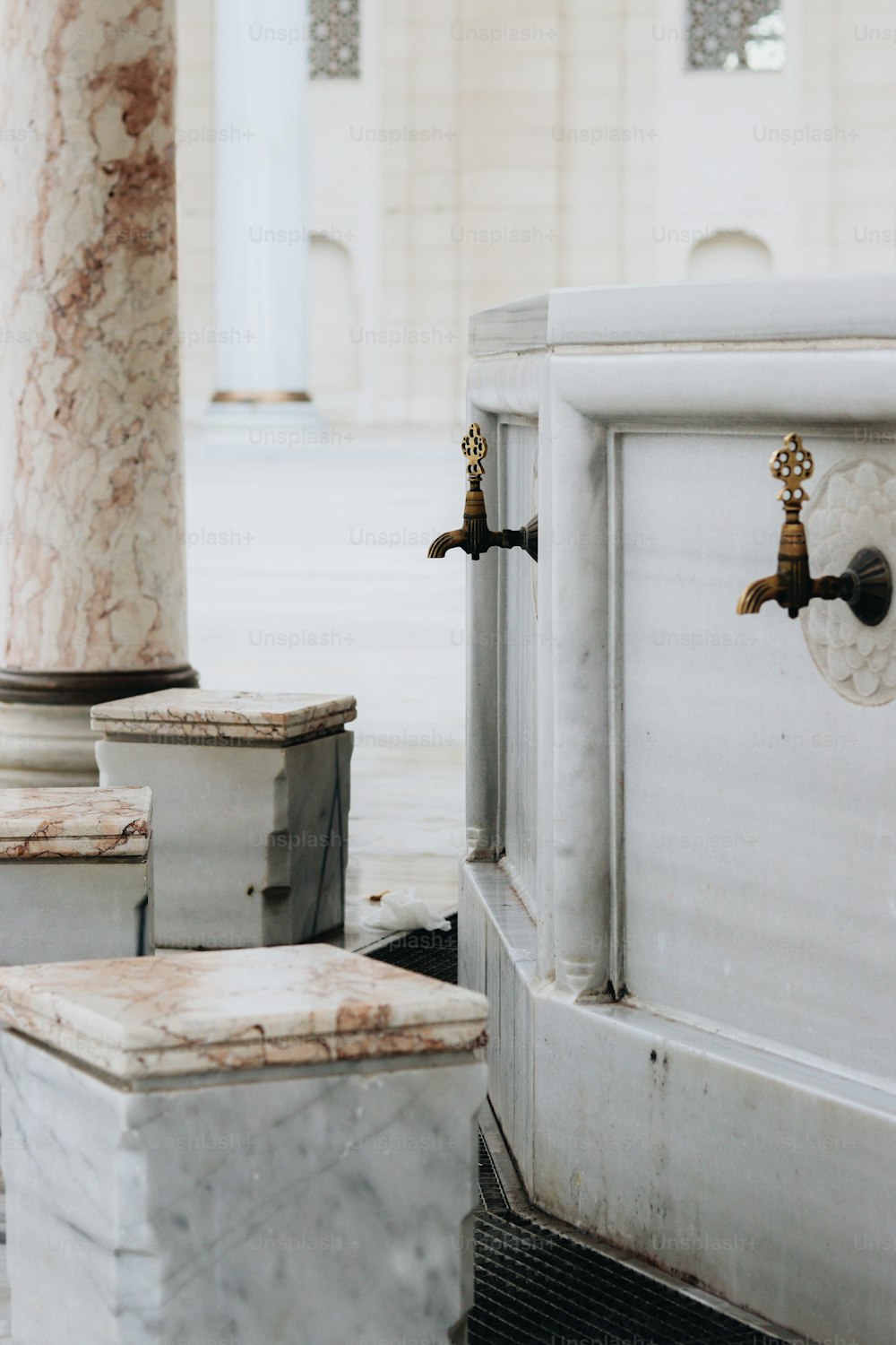 a couple of white pillars sitting next to each other