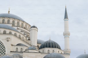 a large white building with a blue dome