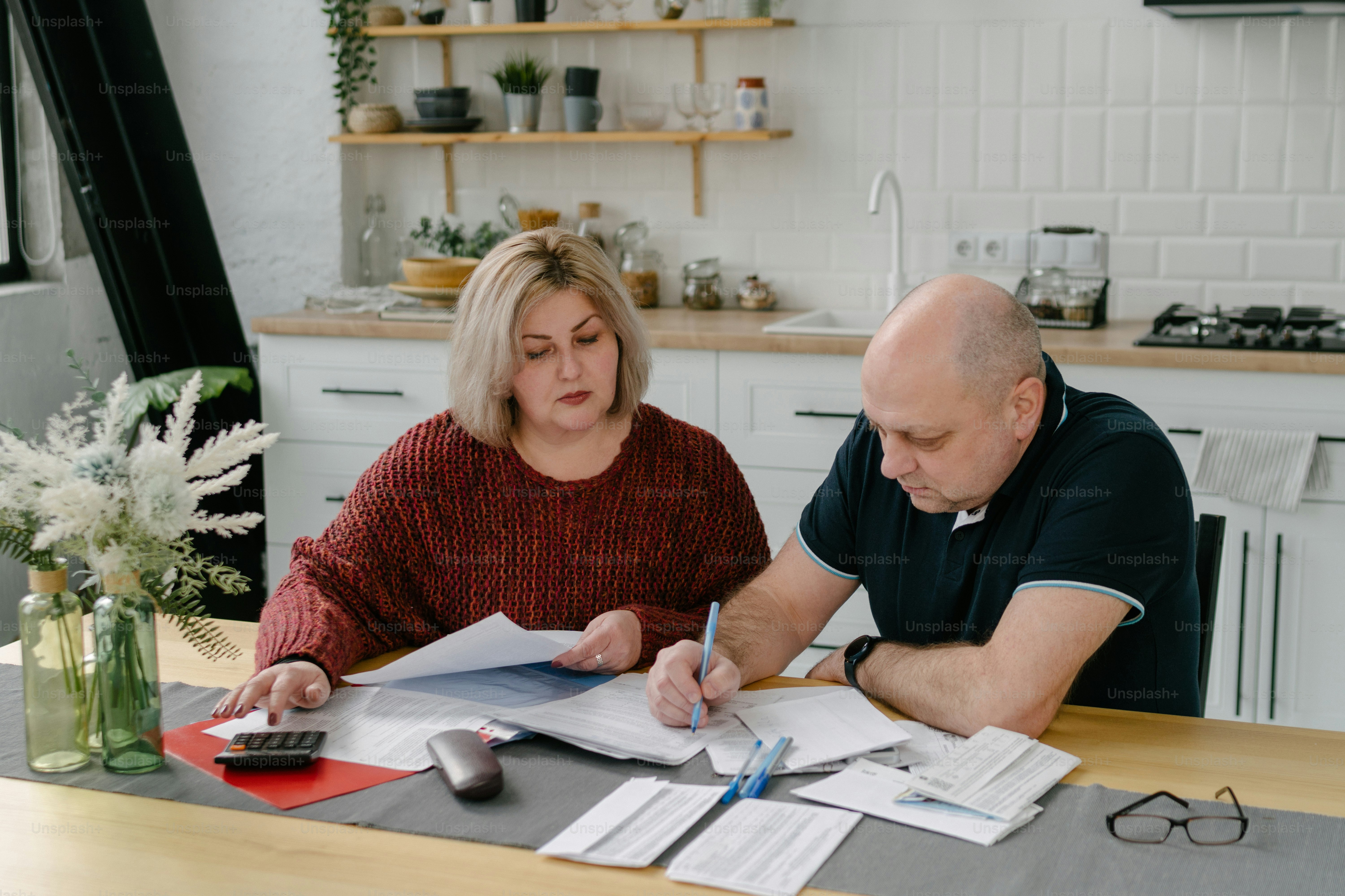 Family reviewing inheritance paperwork about will vs Islamic inheritance rules