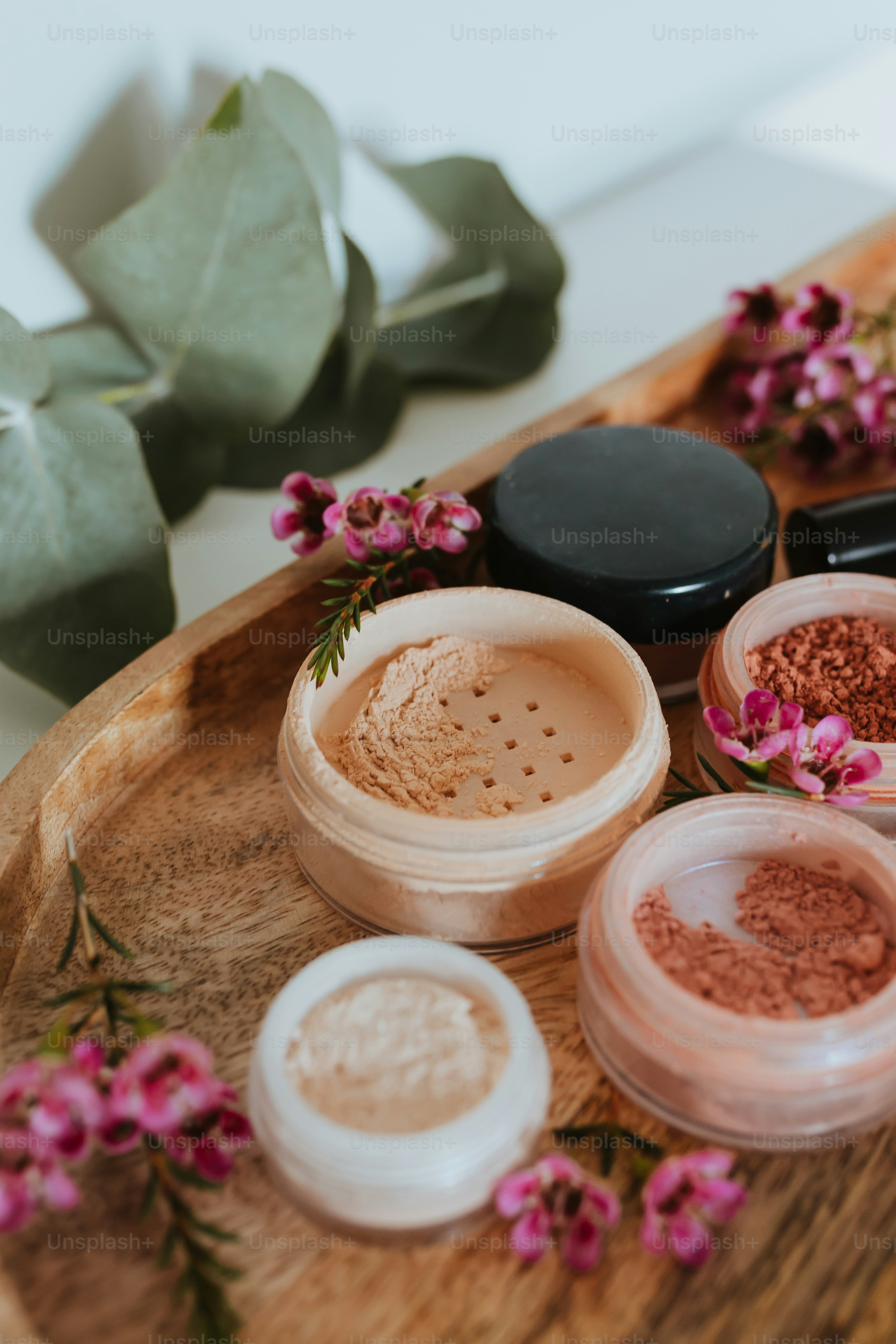 a wooden tray topped with different types of powder