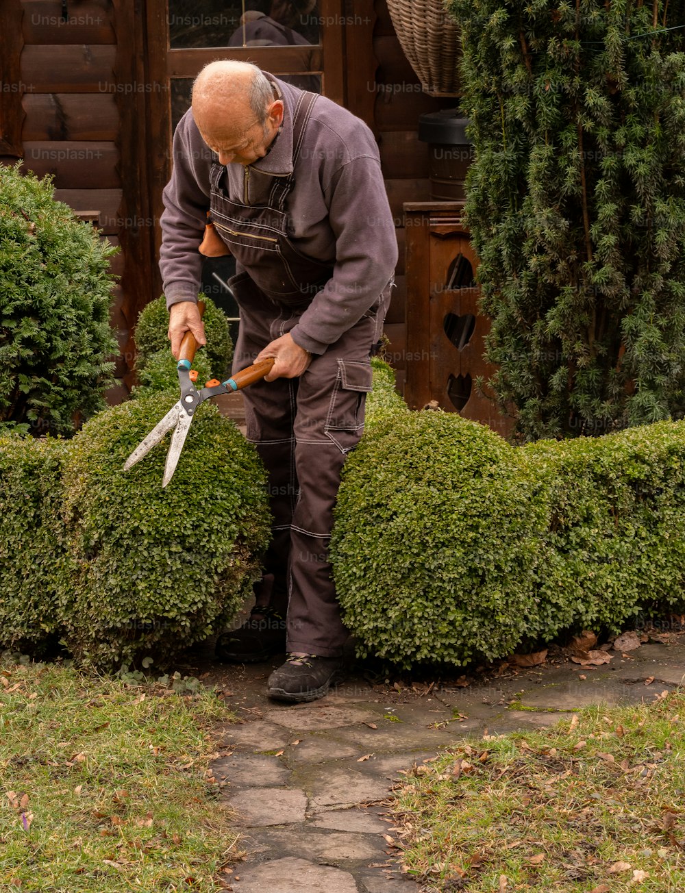 a man with a pair of scissors in his hands