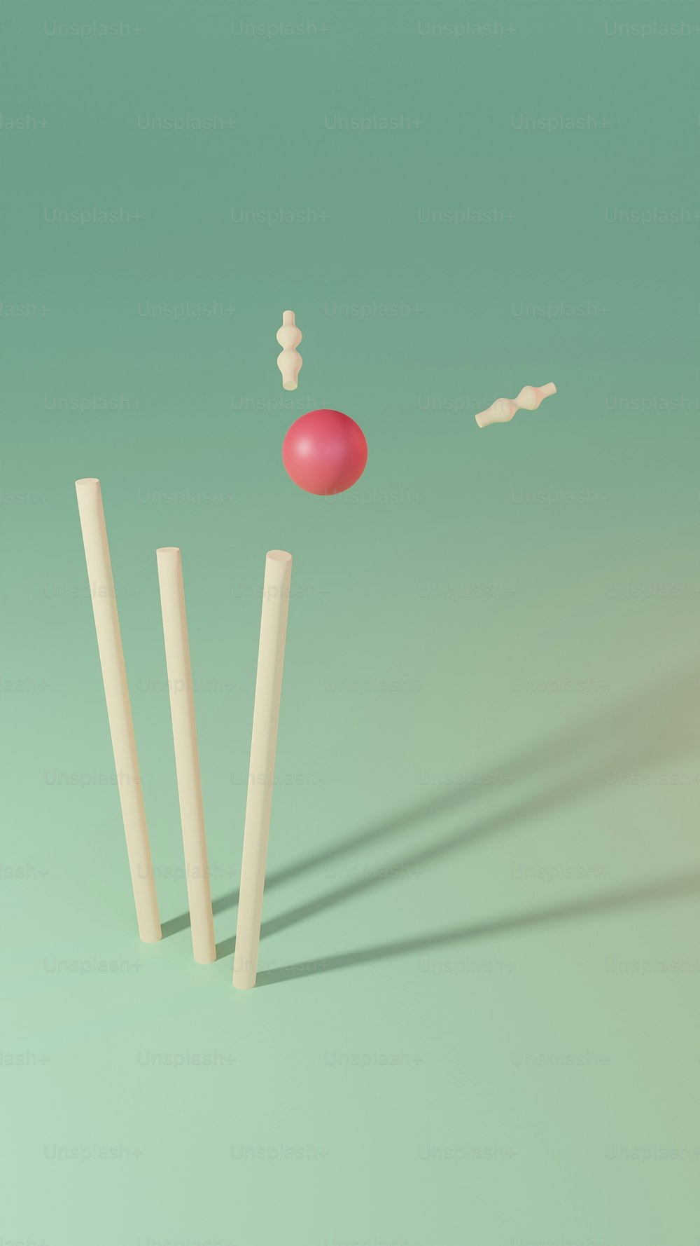 a red ball is hitting a white stick