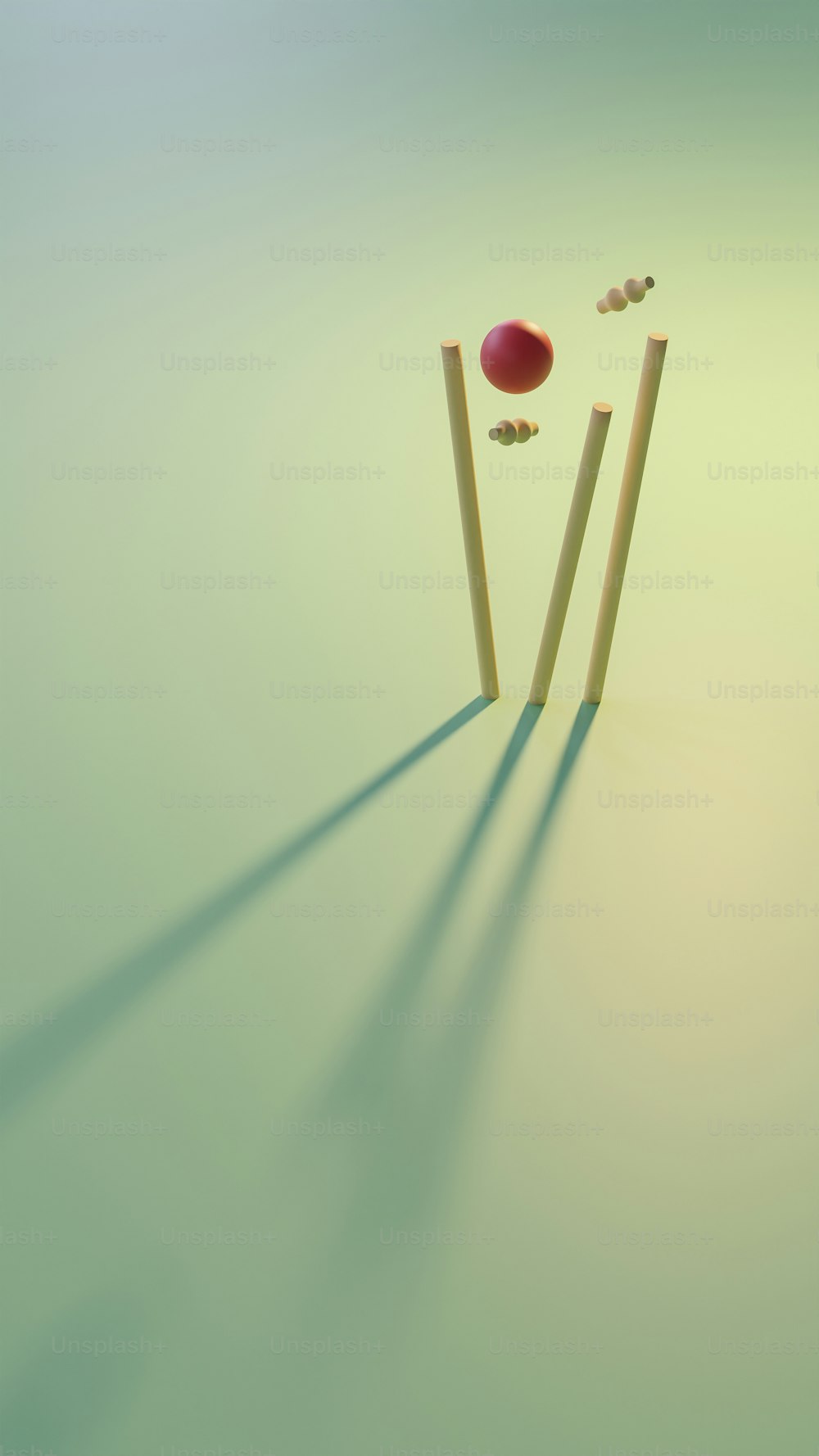 a cricket ball hitting a pair of wooden sticks