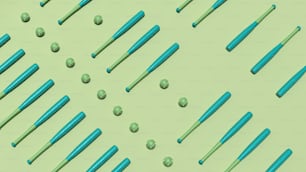 Un grupo de cepillos de dientes azules colocados sobre una superficie verde