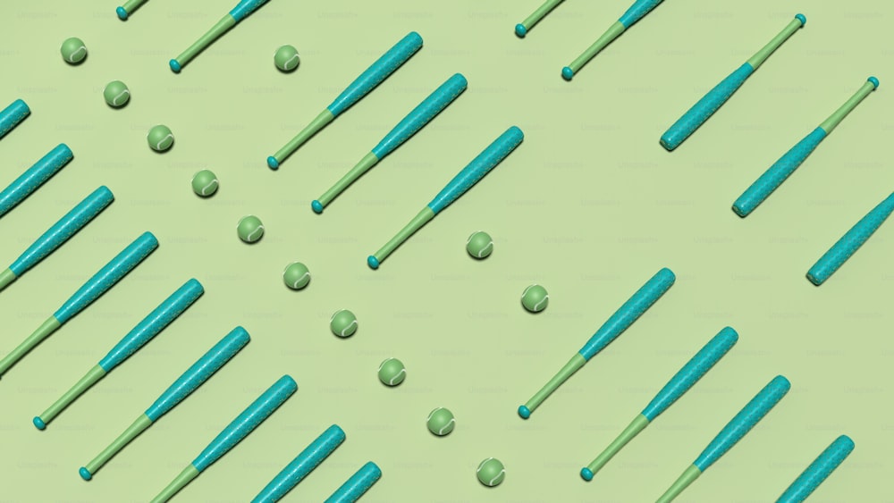 un groupe de brosses à dents bleues posées sur une surface verte