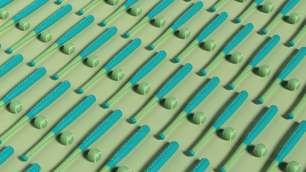 un motif de brosses à dents vertes et bleues sur une surface verte