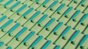 ein Muster aus grünen und blauen Zahnbürsten auf einer grünen Oberfläche