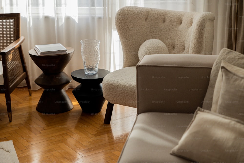 a living room filled with furniture and a window