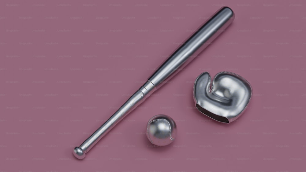 a metal object on a pink surface