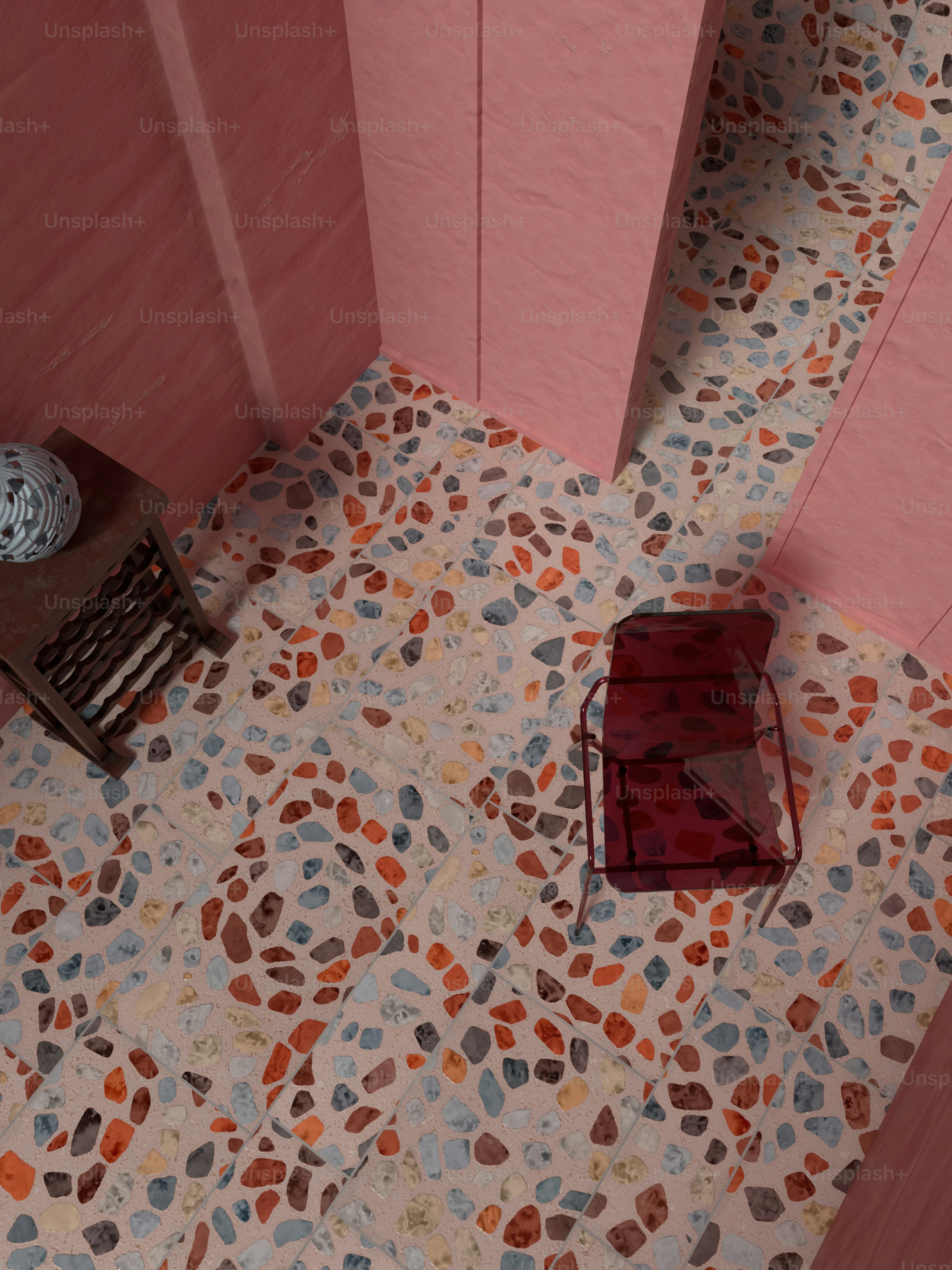 a bathroom with a toilet and a chair on the floor