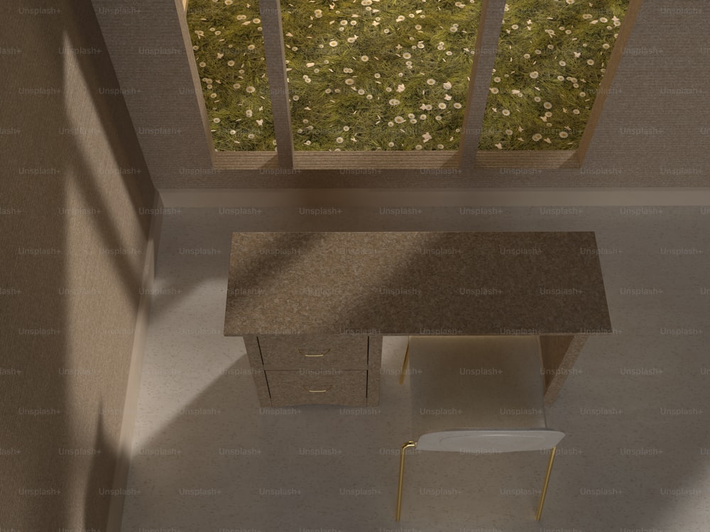 uma vista aérea de uma mesa e cadeira em um quarto