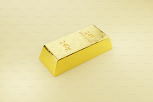 un lingot d’or sur fond jaune
