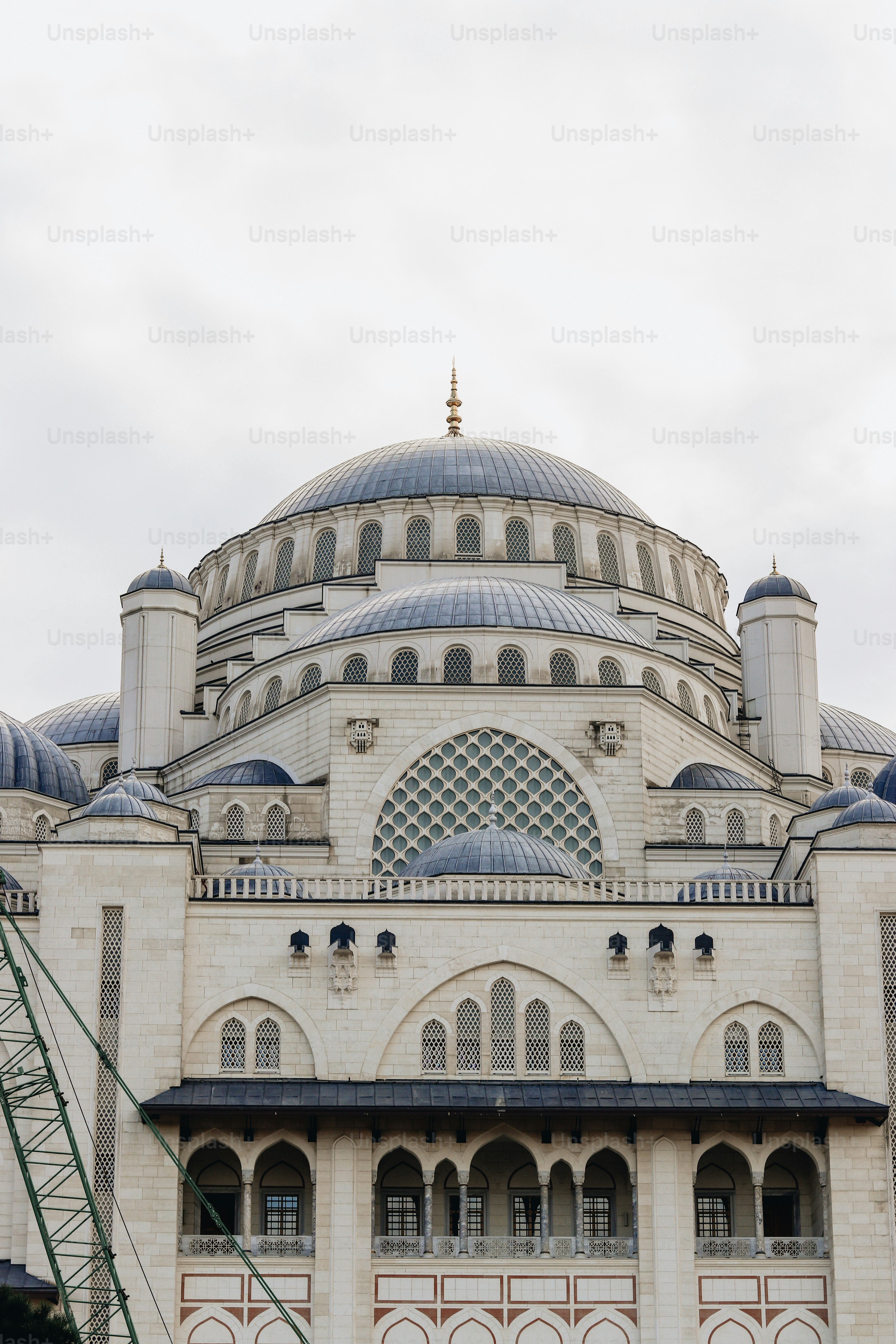 a large white building with a blue dome