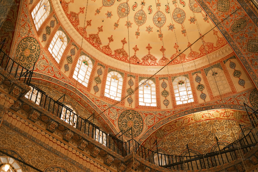 the ceiling of a building with many windows