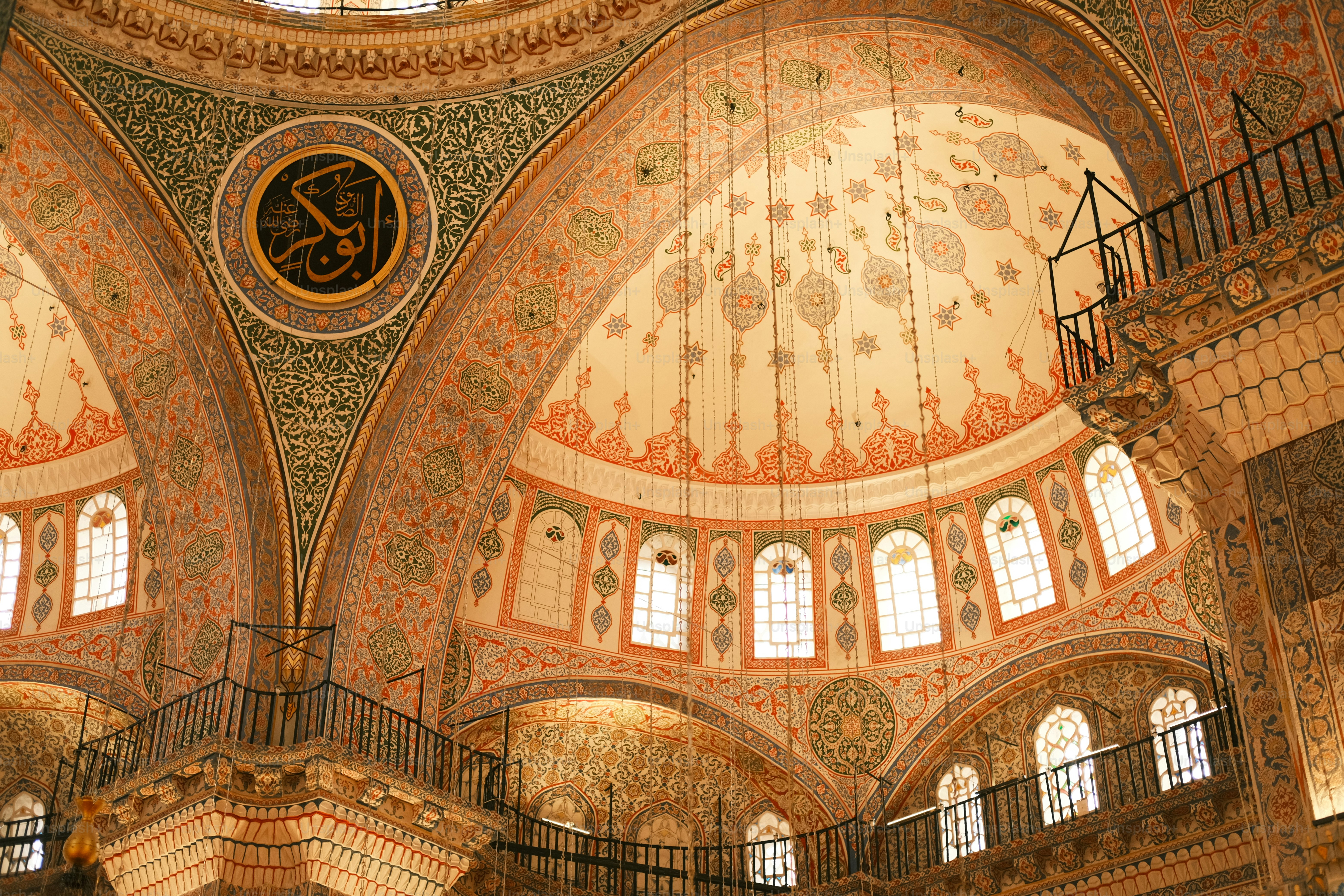 a large ornate building with a clock on the wall