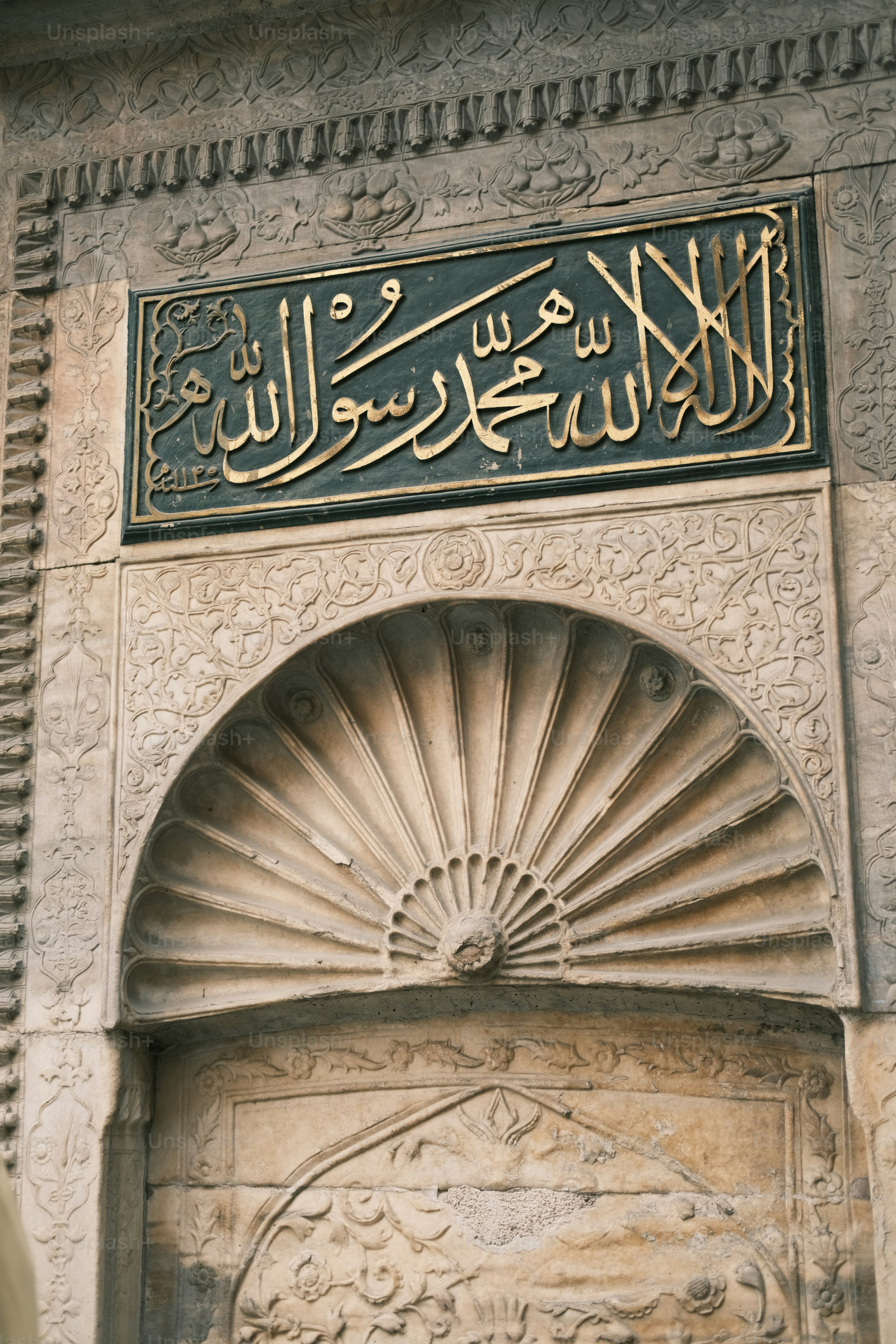 a close up of a building with a sign on it