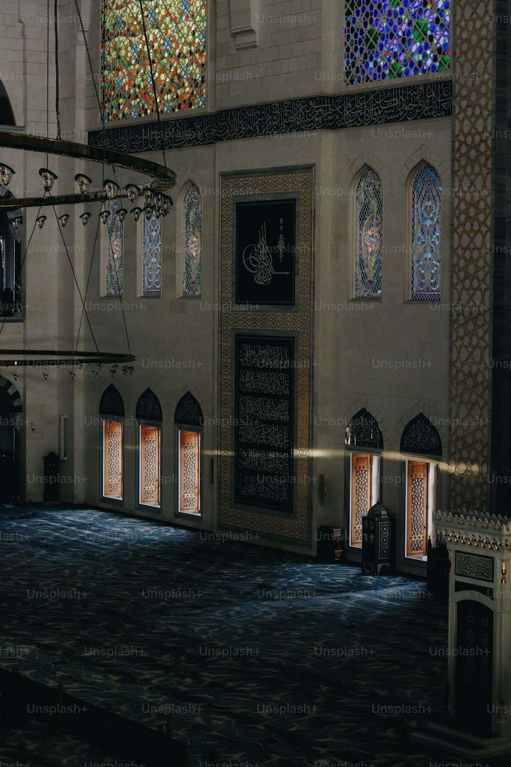 the inside of a building with stained glass windows