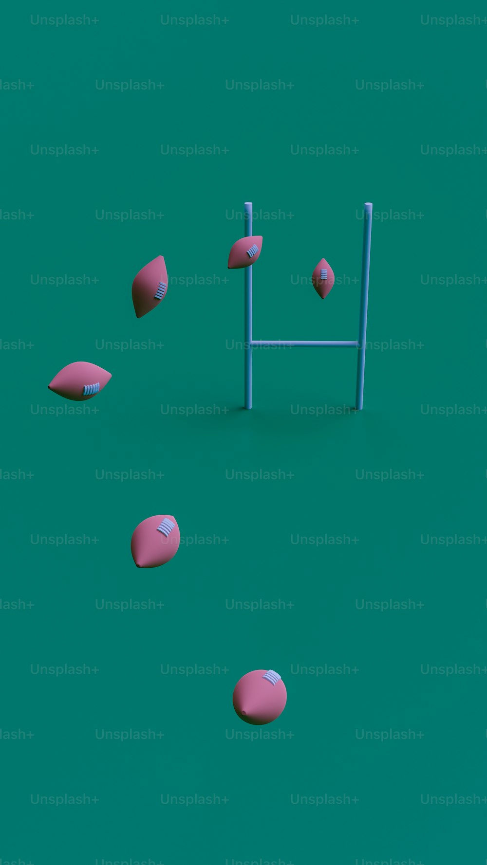 a group of pink balls floating on top of a green surface