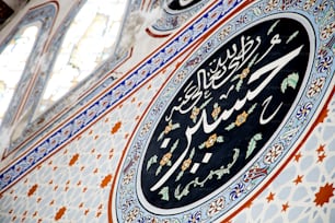 a close up of a clock on a building