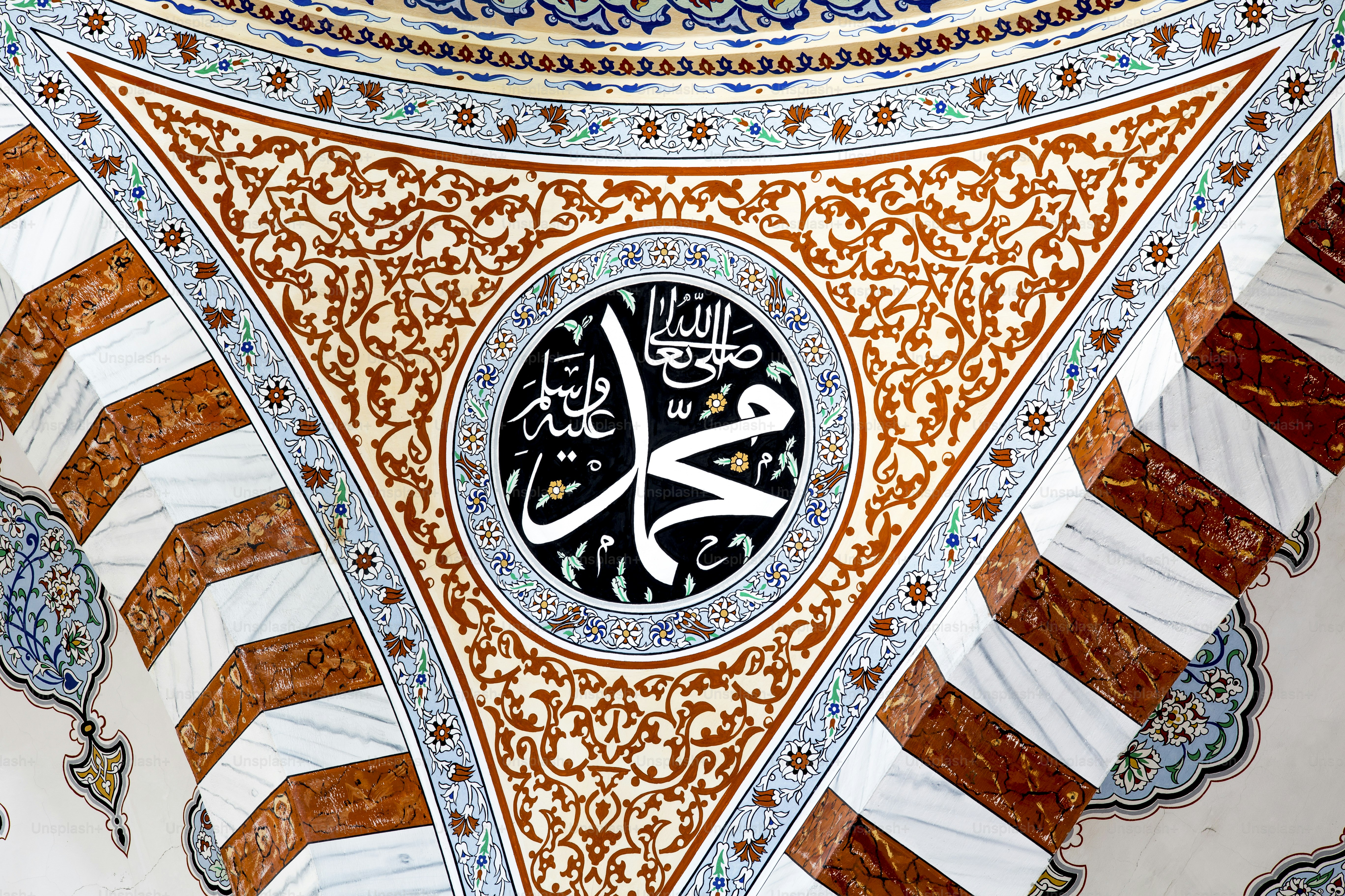 a close up of a clock on the side of a building