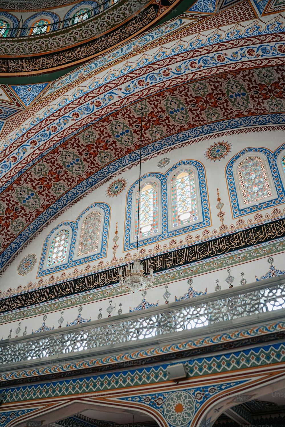 a building with a very ornate ceiling and windows