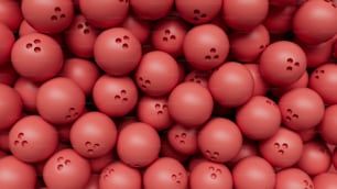 a bunch of red balls with holes in them