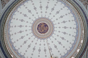 a ceiling with a blue and white design on it