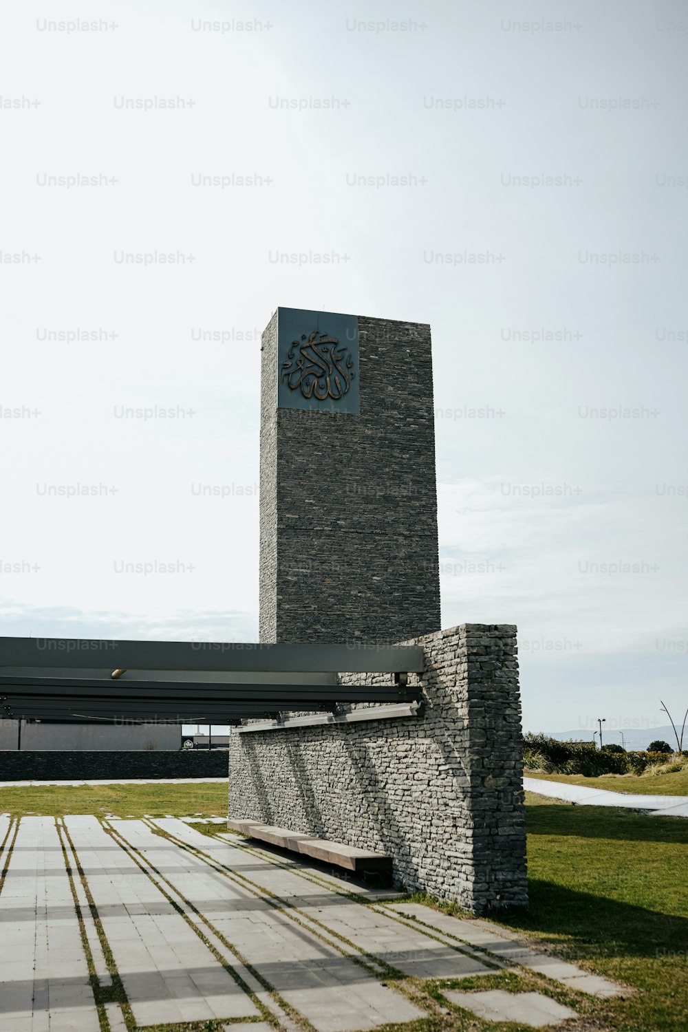 a stone building with a clock on it