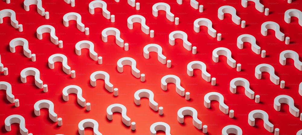 a large group of white question marks on a red background