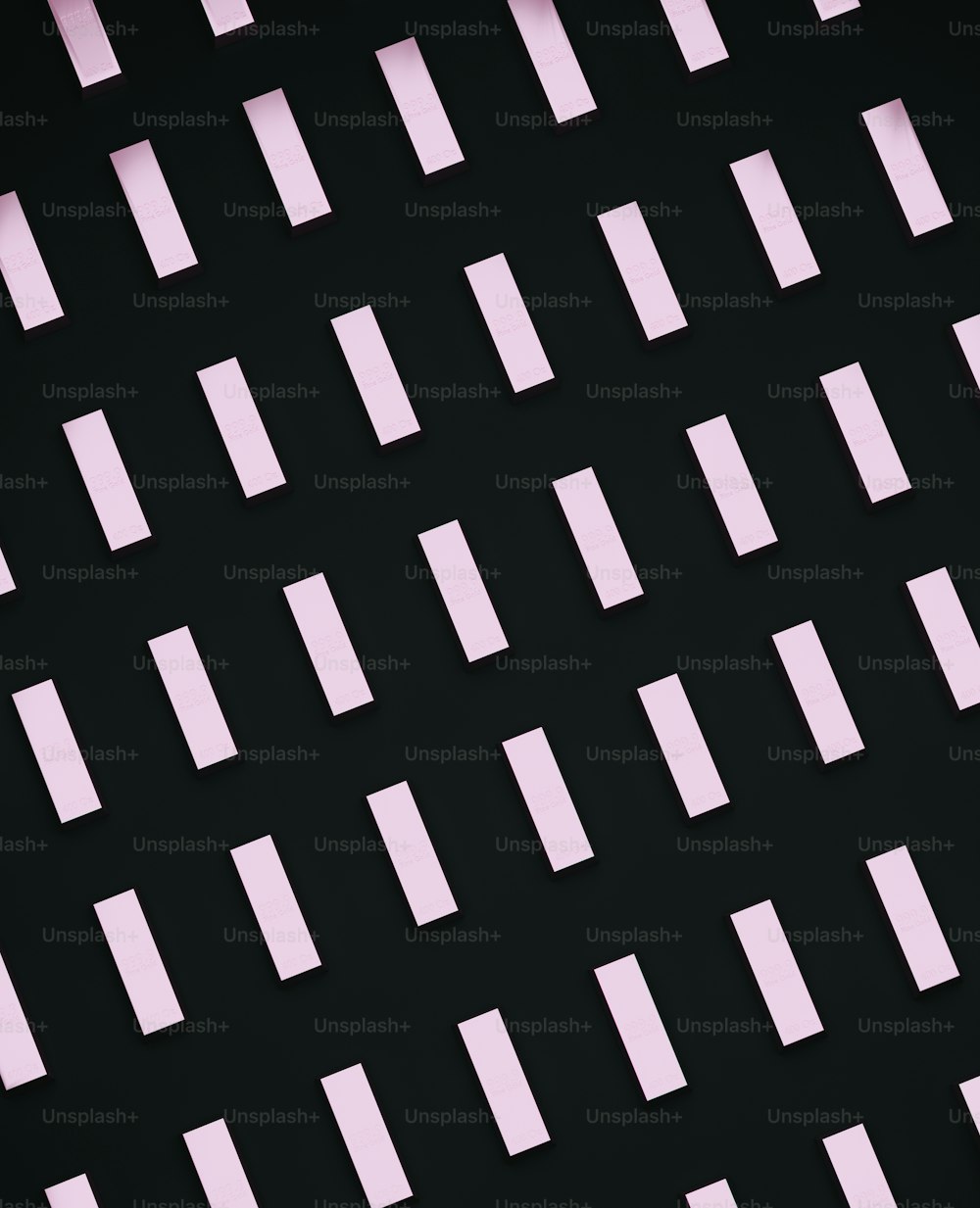 a black background with pink squares on it