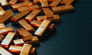 a pile of gold bars laying on top of each other