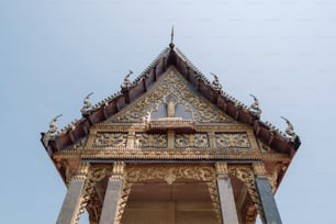 a tall tower with a clock on the top of it