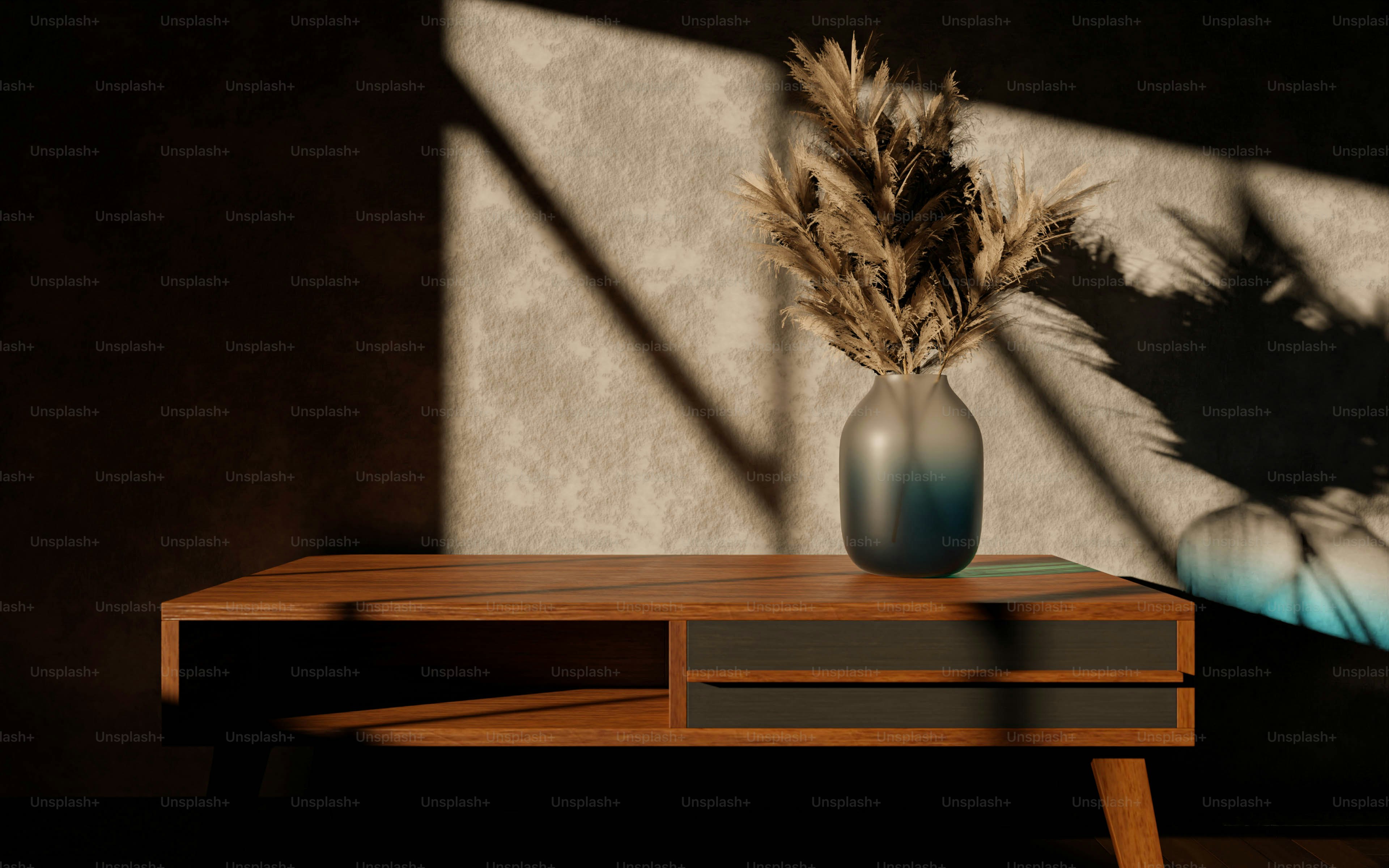 a table with a vase and a plant on it