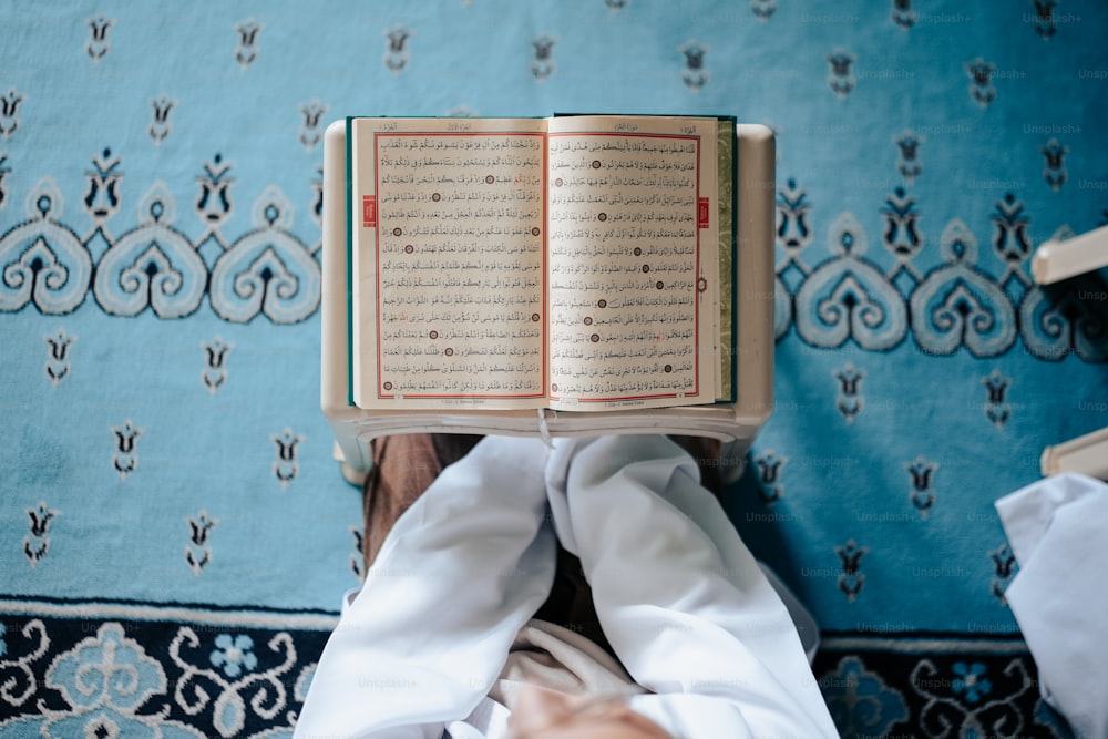 a person holding a book in their hands