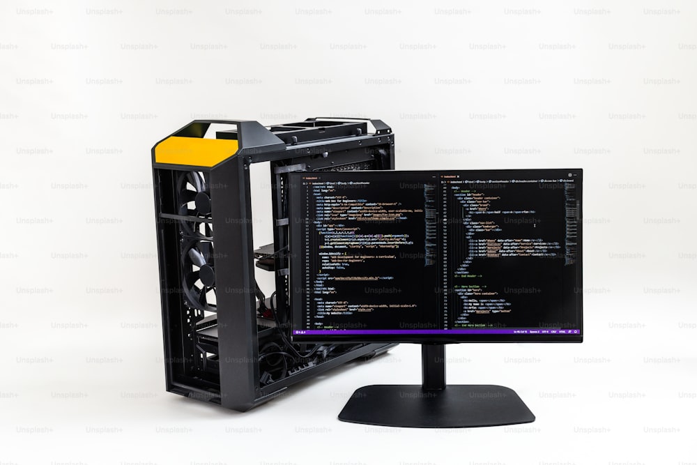 ein Computermonitor, der auf einem Schreibtisch sitzt