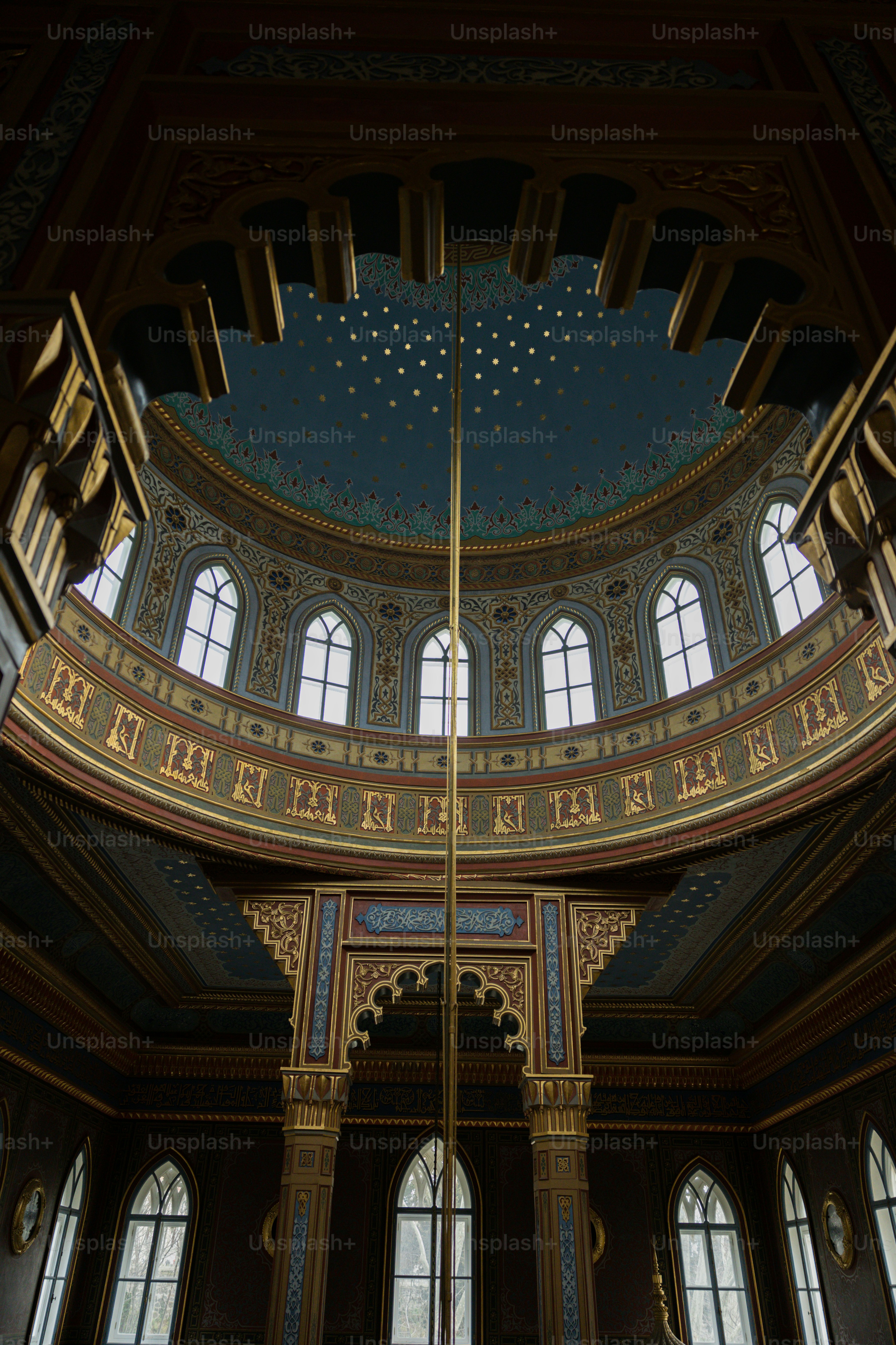 a large room with many windows and a skylight