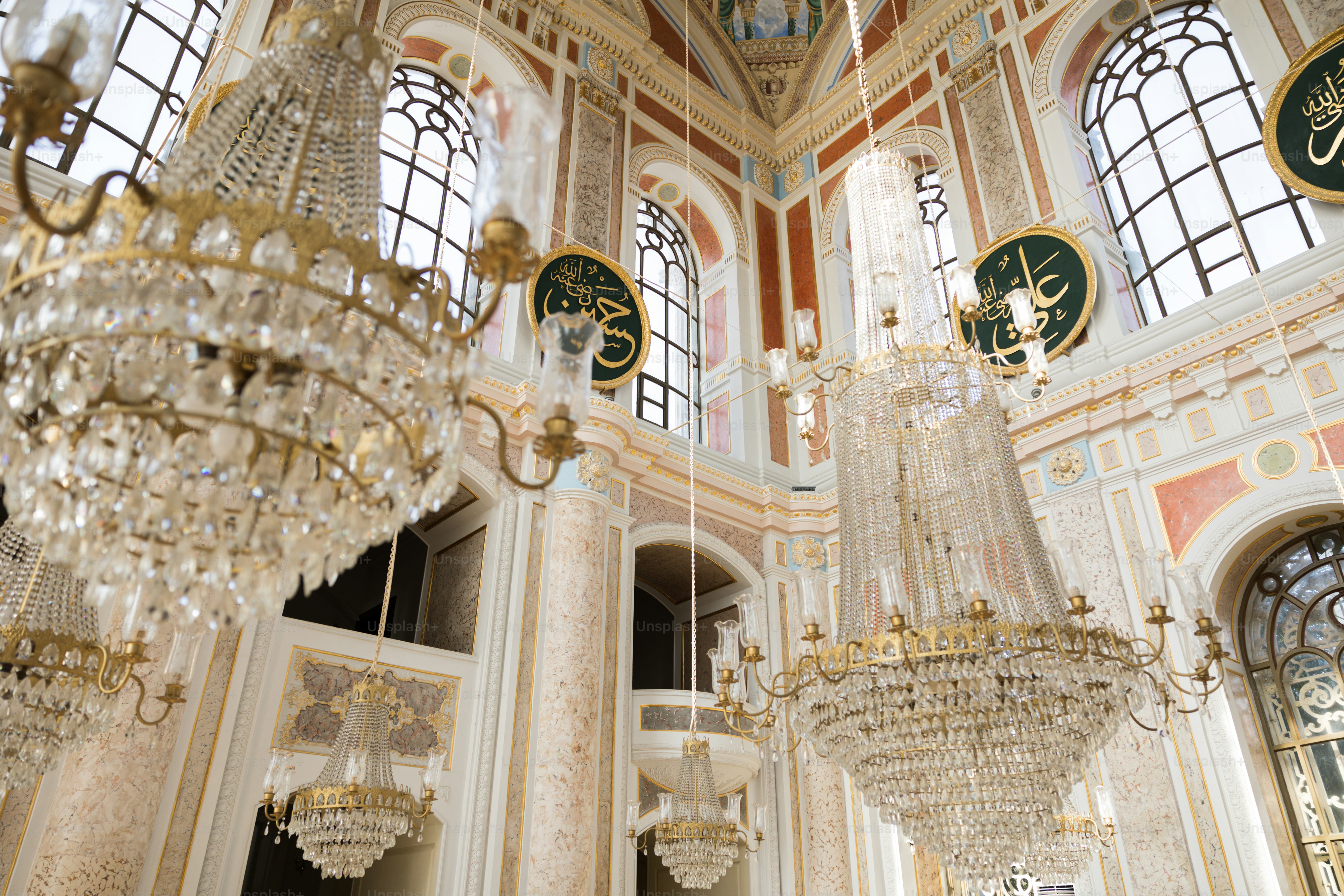 a chandelier hanging from the ceiling of a building