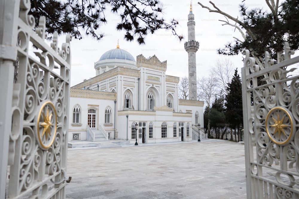 a large white building with a blue dome