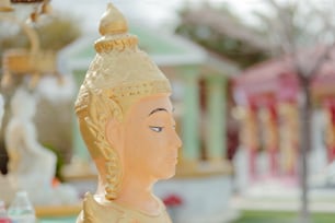 a close up of a statue of a buddha