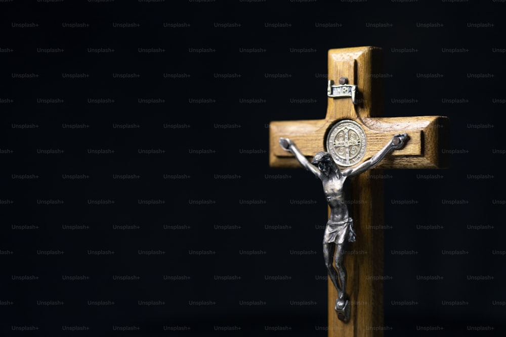 a wooden cross with a crucifix on it